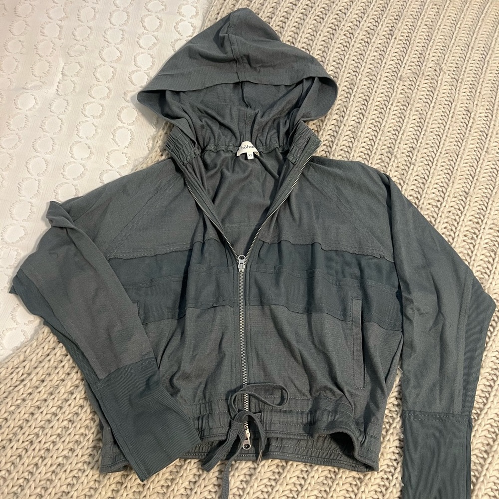 Blue green athletic style lounge wear jacket.